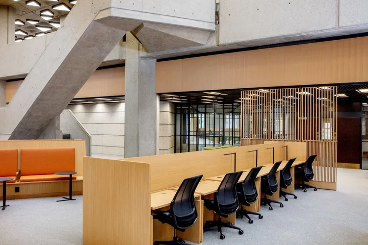Institutional millwork installation with precise alignment to base building conditions